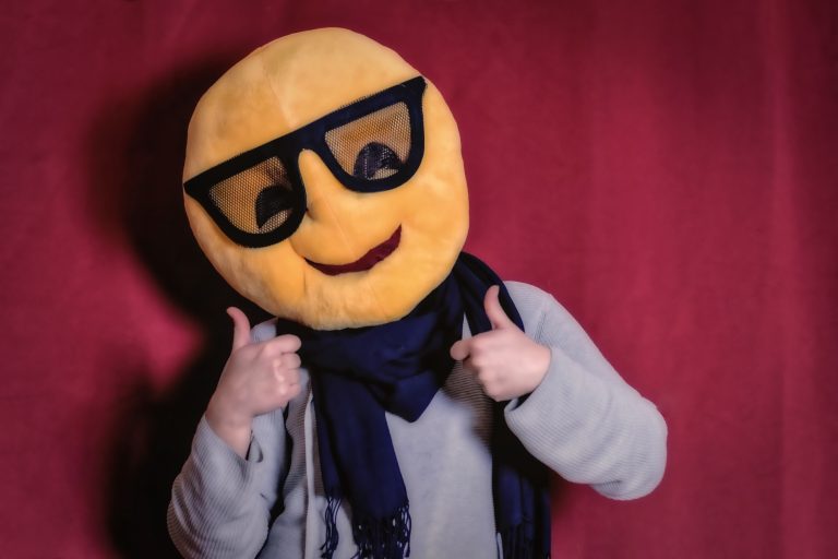 Man with Smiley Face Costume and Thumbs Up